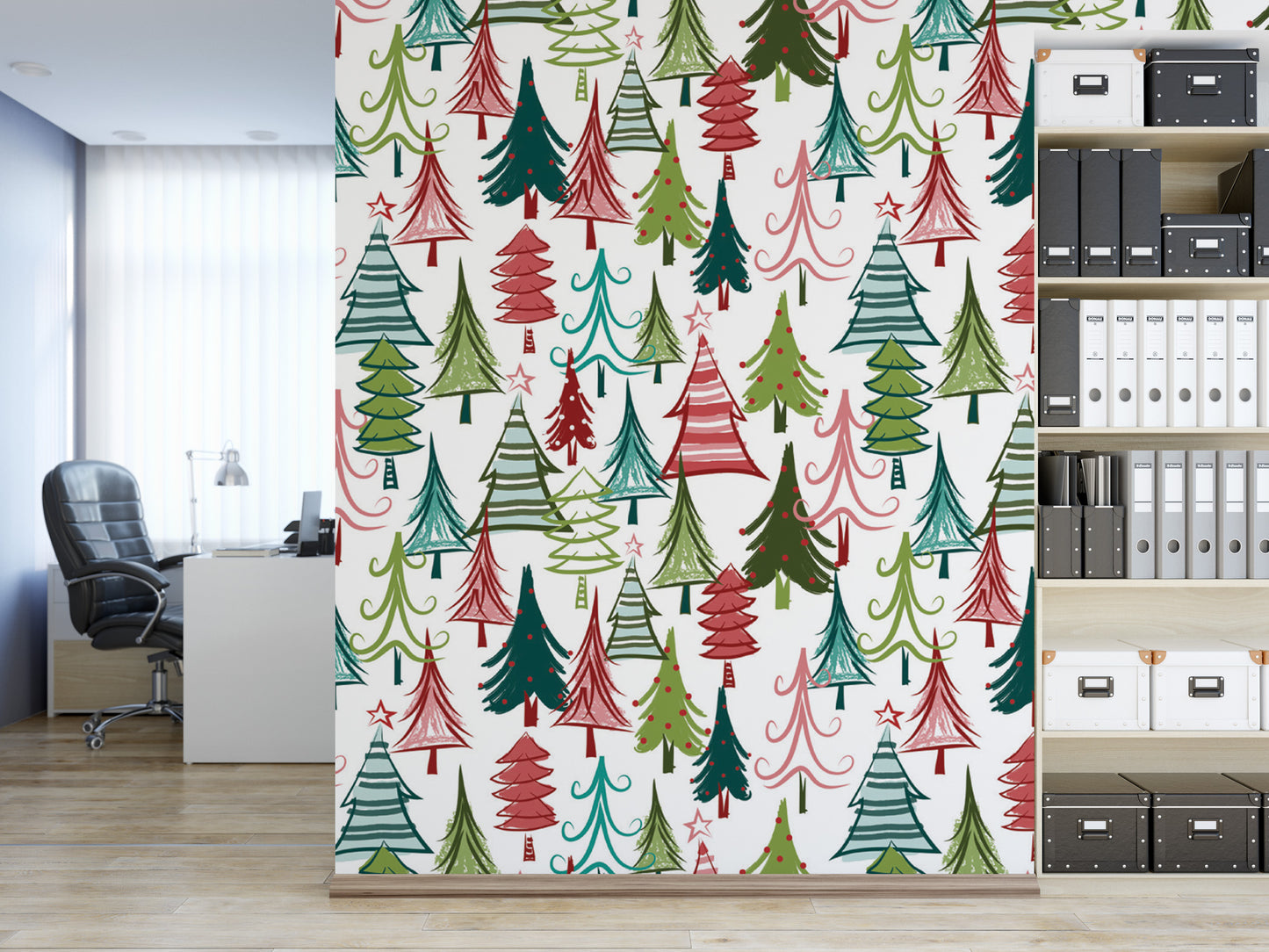 a wall with a repeating pattern of Christmas trees in various colors, including red, green, and white. The wall is decorated with a festive design, creating a warm and cheerful atmosphere. In the background, there is a desk with a computer and a bookshelf filled with books and binders.