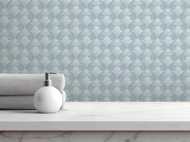 a white soap dispenser on a white marble countertop, with a stack of folded towels and a white bottle of lotion to the side.