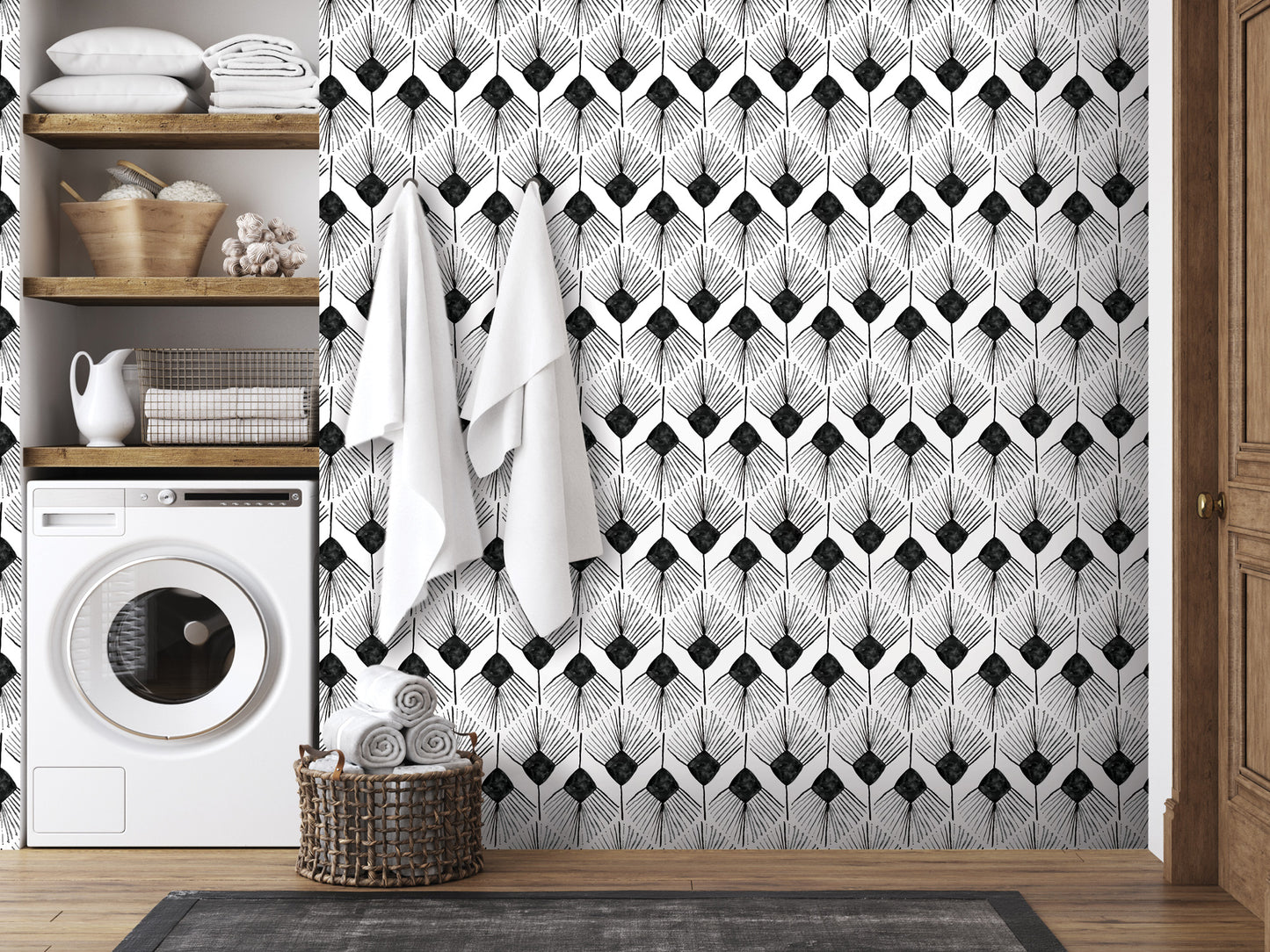 a modern bathroom with a black and white geometric patterned wallpaper, a washing machine, and a basket of towels.