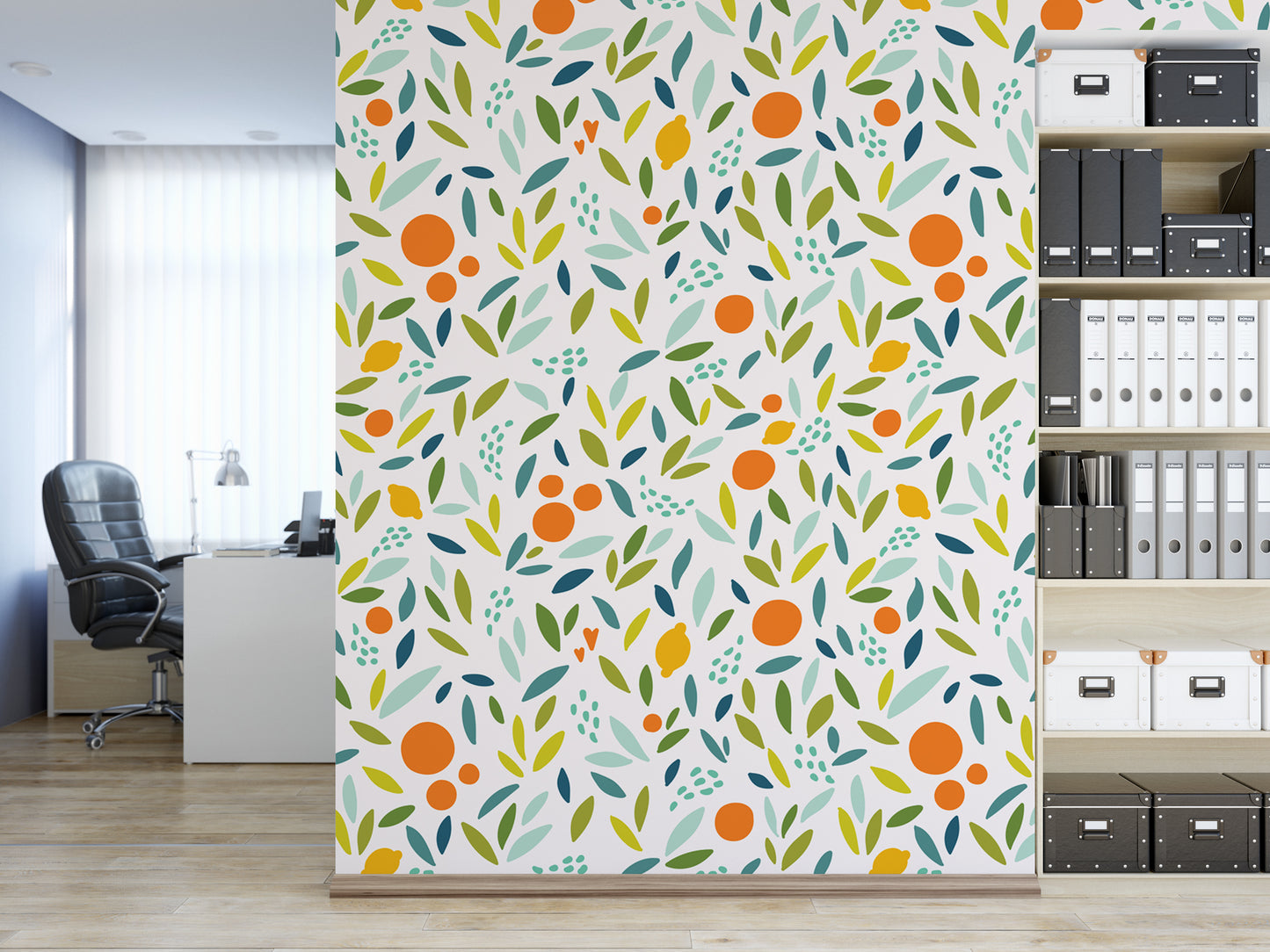 a modern office space with a vibrant wall mural depicting a pattern of orange and green leaves, along with small orange and green circles. The office has a desk, chair, and bookshelves filled with various books and folders.