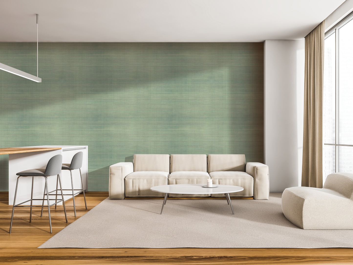 a modern living room with a white sofa, a round coffee table, and a barstool. The room has a green accent wall and a large window, creating a bright and airy atmosphere.
