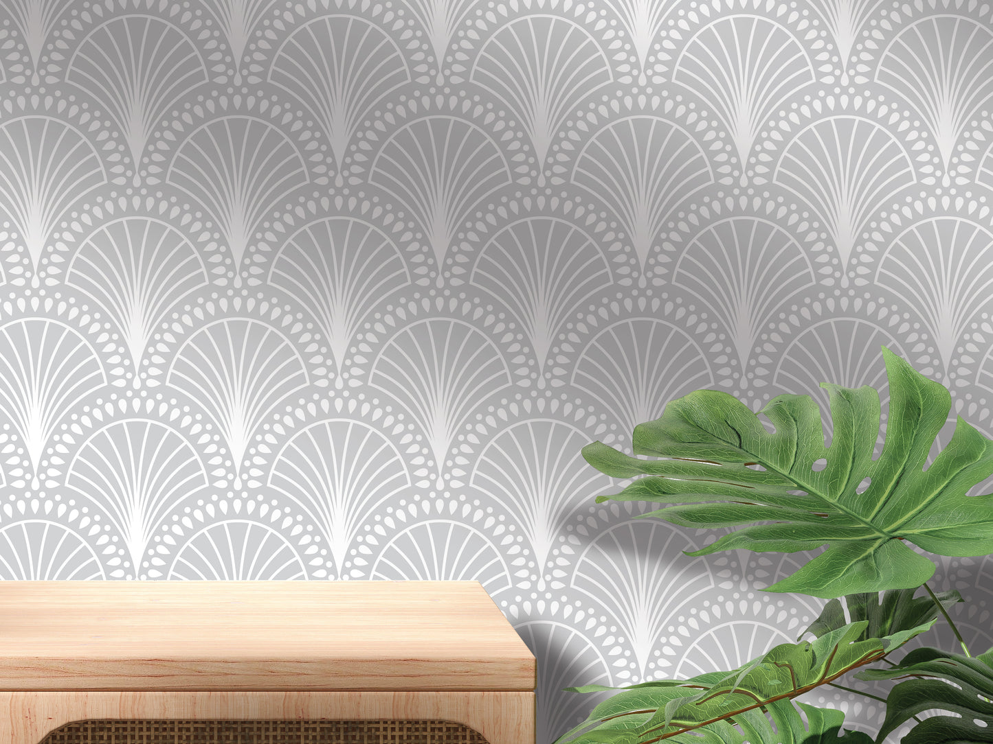 a wooden table with a plant on top of it, set against a wall with a repeating pattern of gray and white floral designs.