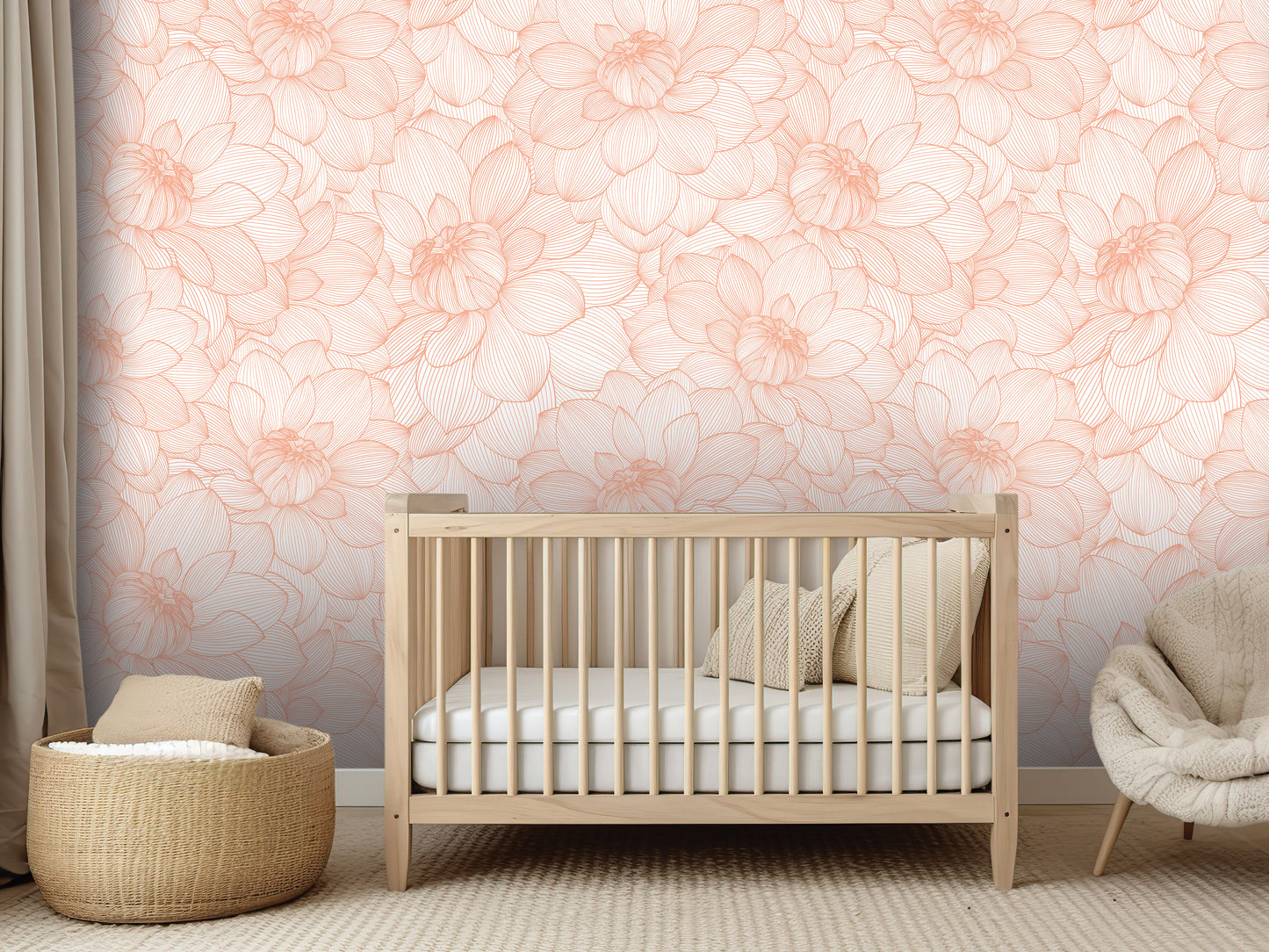 a nursery room with a wooden crib, a woven basket, and a plush chair. The walls are adorned with a floral wallpaper in shades of peach and white, creating a serene and calming atmosphere.