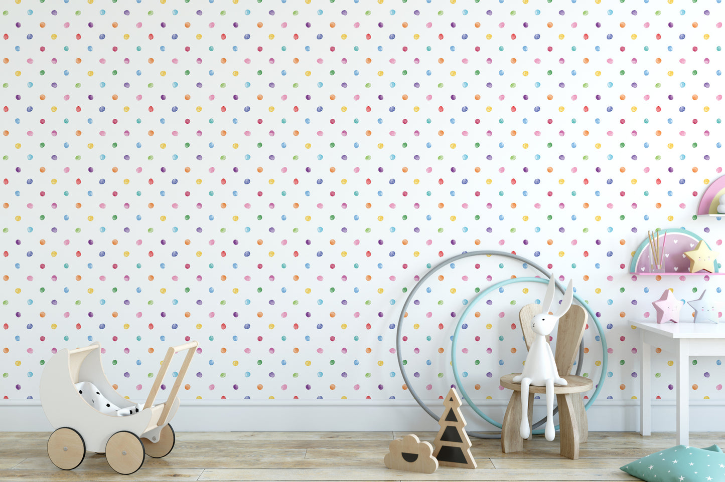 A colorful polka dot wallpaper in a child's bedroom, with a wooden toy car, a wooden chair, and a wooden toy rabbit on the floor.