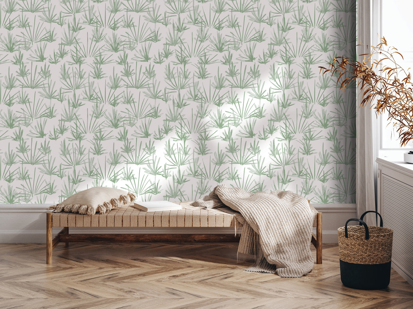 a cozy living room with a wooden bench, a woven basket, and a potted plant. The room has a patterned wallpaper with green and white plants, creating a serene and natural atmosphere.