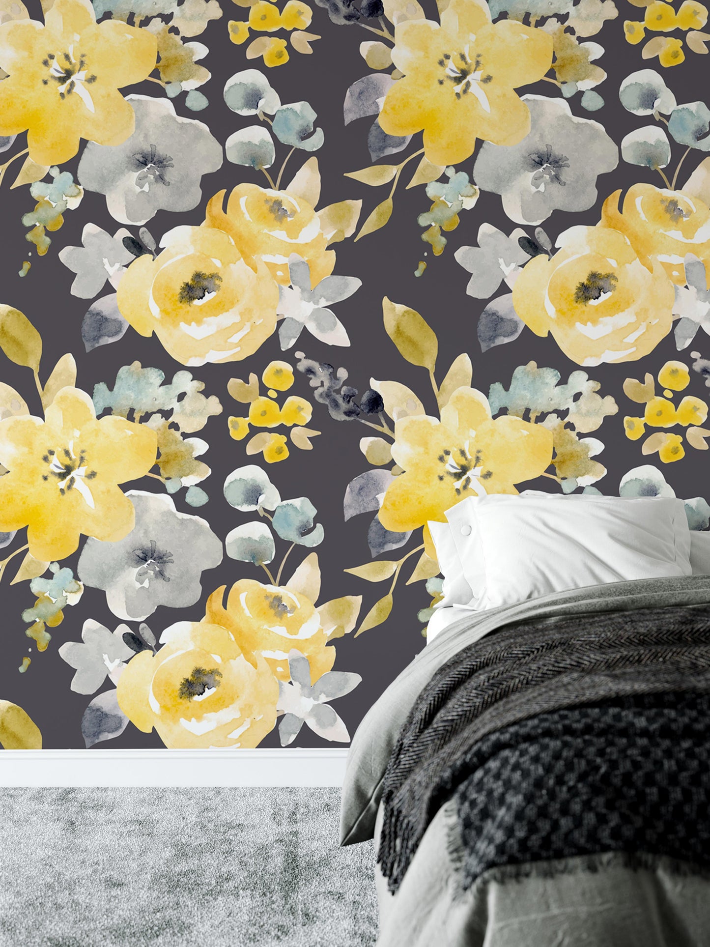 a bedroom setting with a floral wallpaper pattern in shades of yellow and gray. The wallpaper is predominantly yellow, with some gray accents. The bedroom includes a bed with a gray blanket and a white pillow.