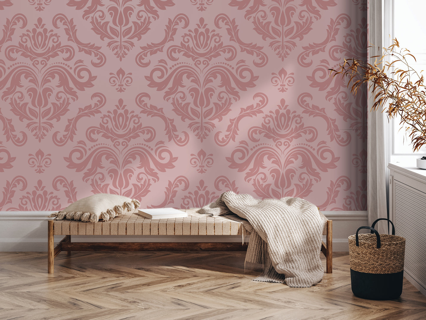 a cozy and inviting living space with a plush bench, a woven basket, and a decorative wallpapered wall.