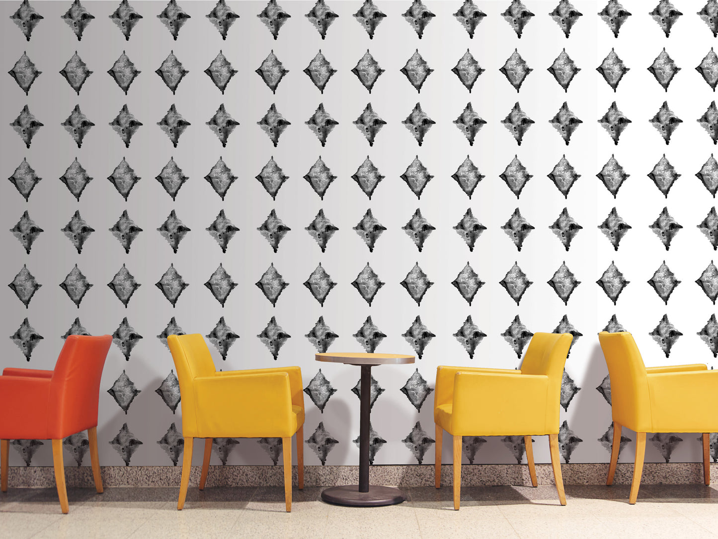 a modern and minimalist design with a white wall adorned with a repeating diamond pattern in black and white. In front of the wall, there are four yellow chairs arranged around a small round table, creating a cozy seating area.