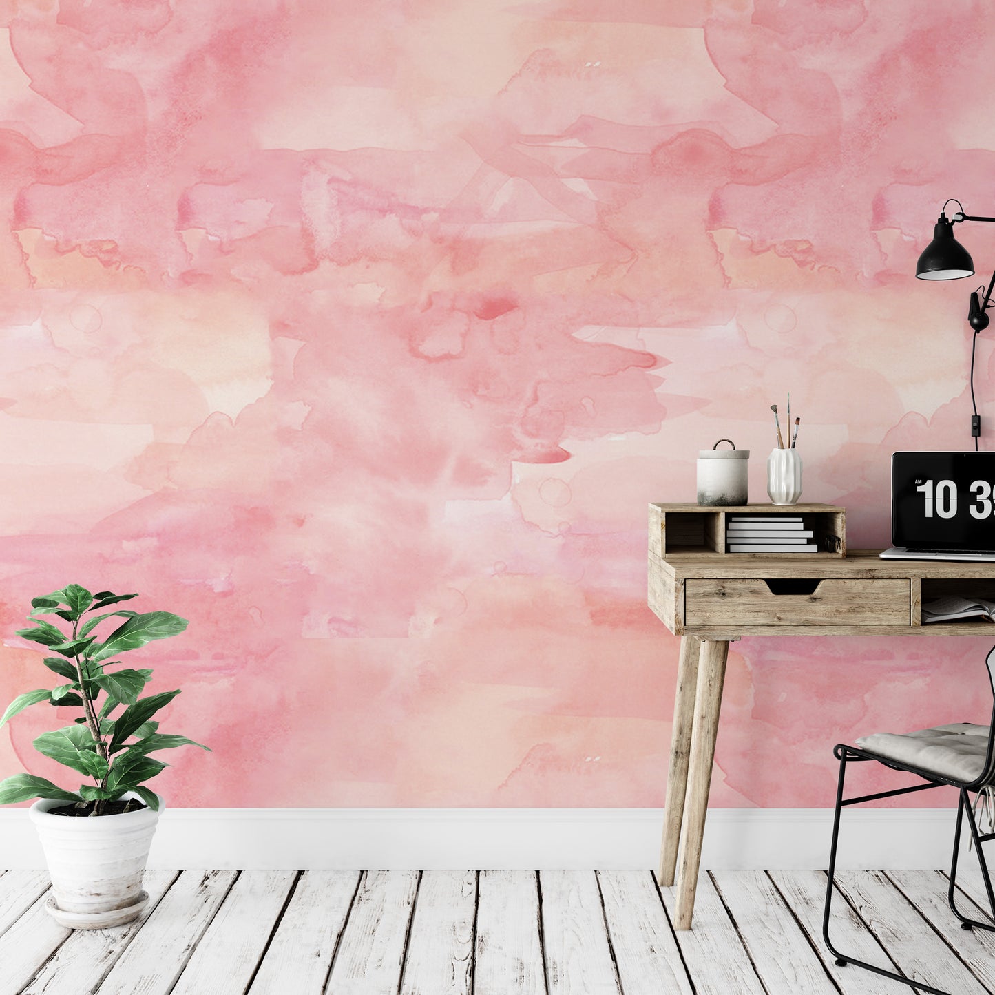 a pink watercolor wallpaper with a wooden desk and chair in the foreground, along with a potted plant and a laptop on the desk.