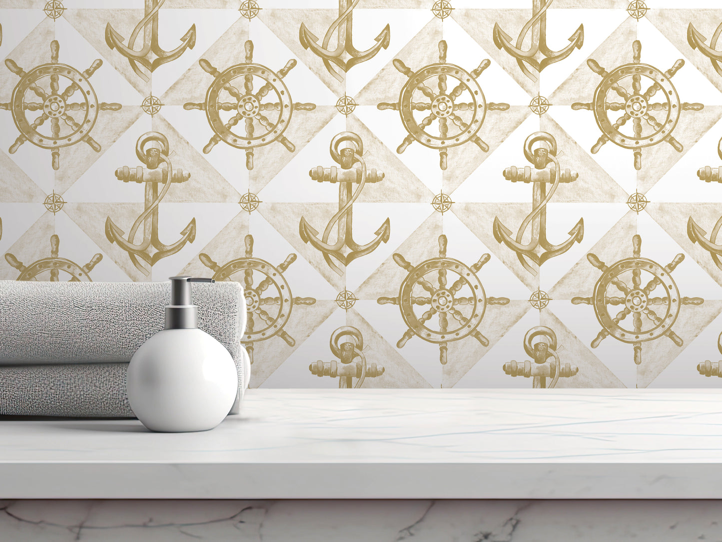 a bathroom counter with a white soap dispenser, a towel, and a white marble surface. The background is a wall with a repeating pattern of gold anchors and ship wheels, creating a nautical theme.