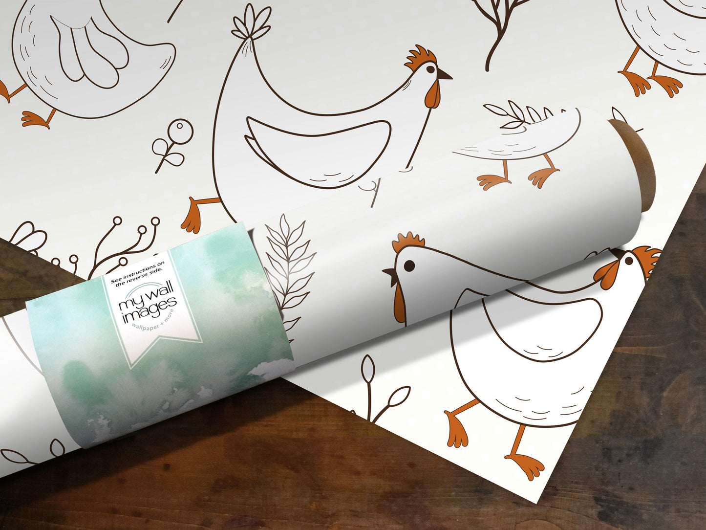 a roll of wrapping paper with a pattern of cartoon-style chickens and other birds.