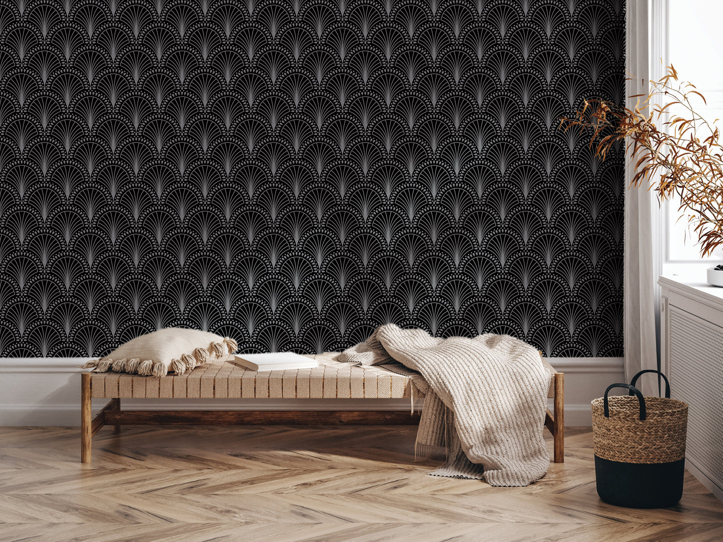 a modern and stylish interior design with a black and white patterned wallpaper, a wooden bench with a white pillow, and a woven basket on the floor.