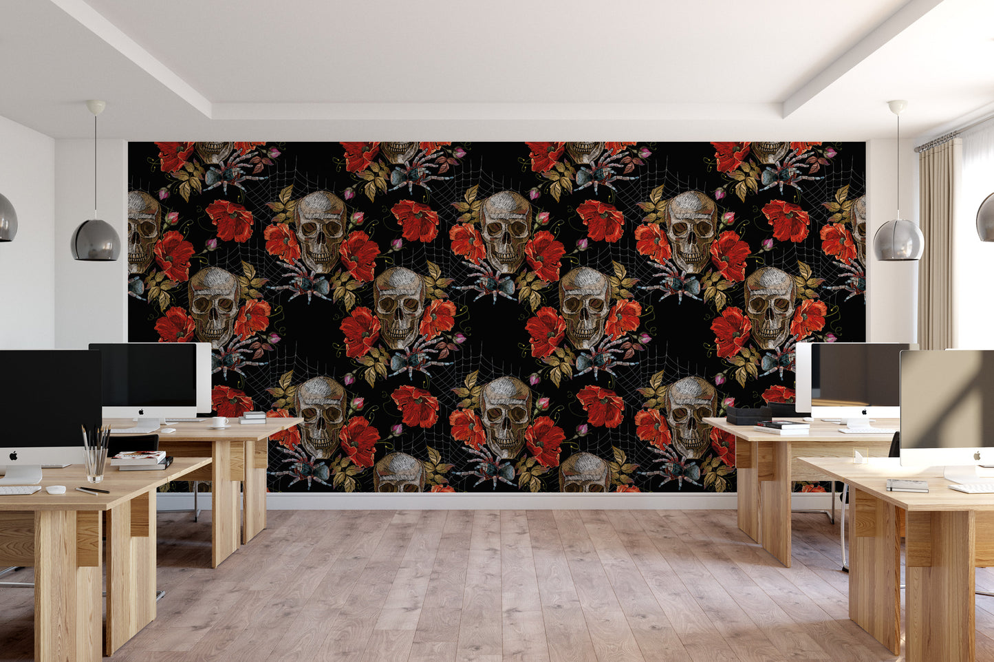 a modern office space with a large wall mural featuring a repeating pattern of skulls and red roses.