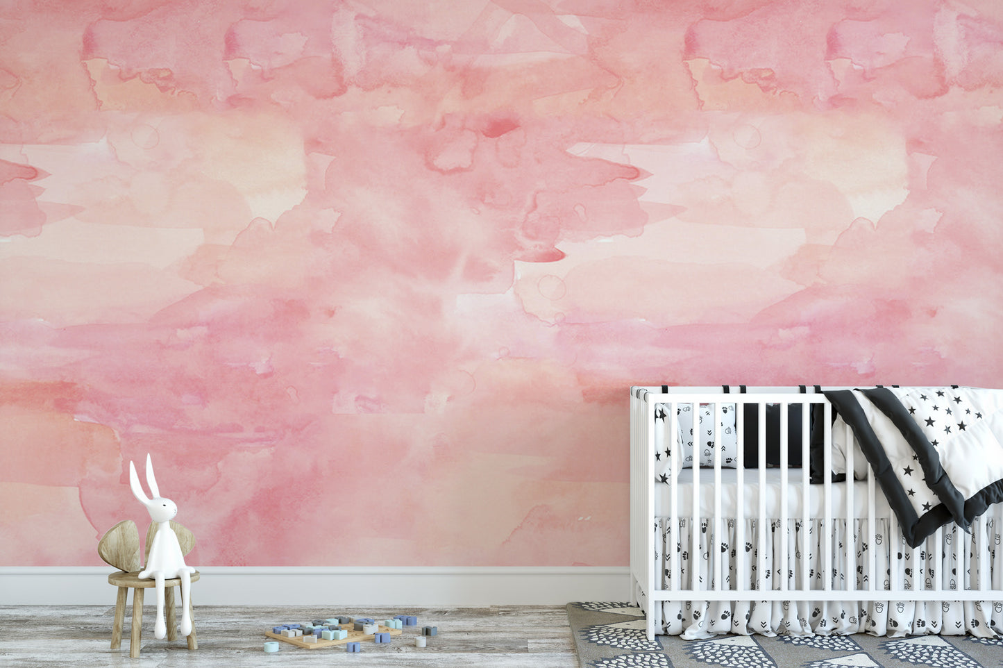 a nursery room with a white crib and a small white rabbit figurine on a wooden stool. The room has a pink and white color scheme, with a textured wall behind the crib.