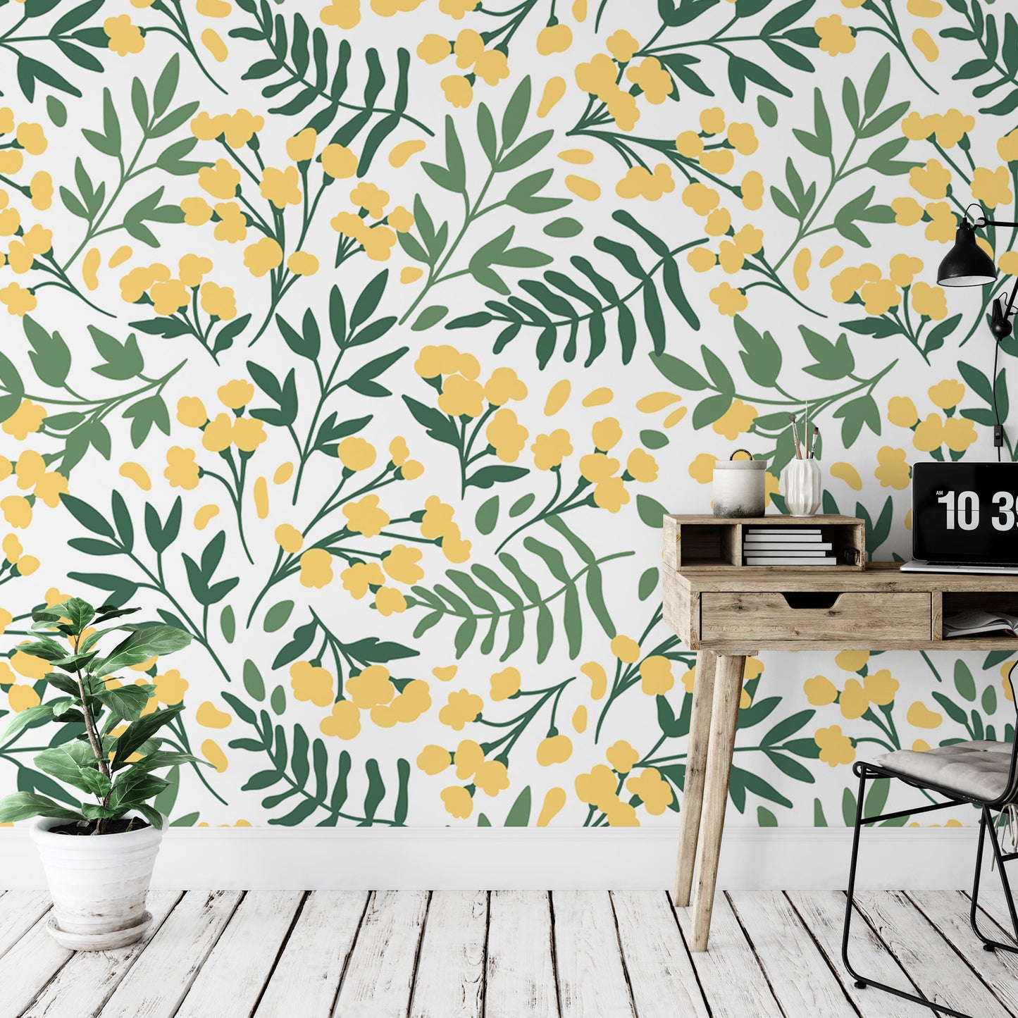 a wallpapered wall with a floral pattern of yellow flowers and green leaves. In front of the wall, there is a wooden desk with a laptop and a plant on it. A chair is also present in the scene.