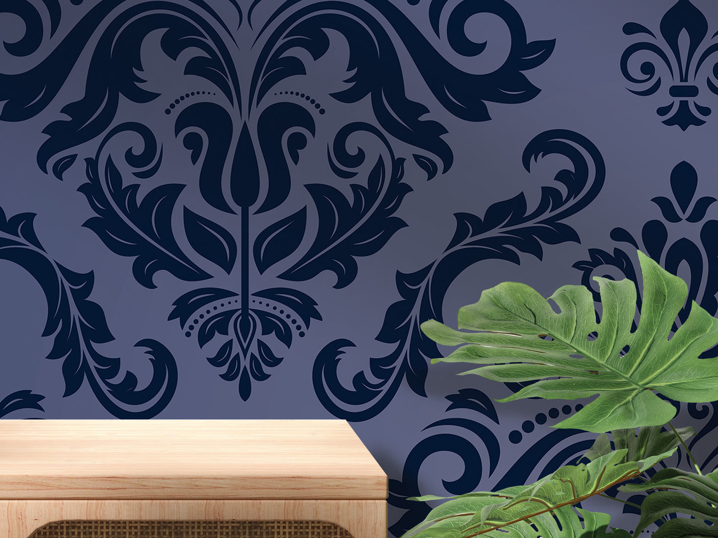 a dark blue wall with a floral pattern, a wooden table, and a large green plant.