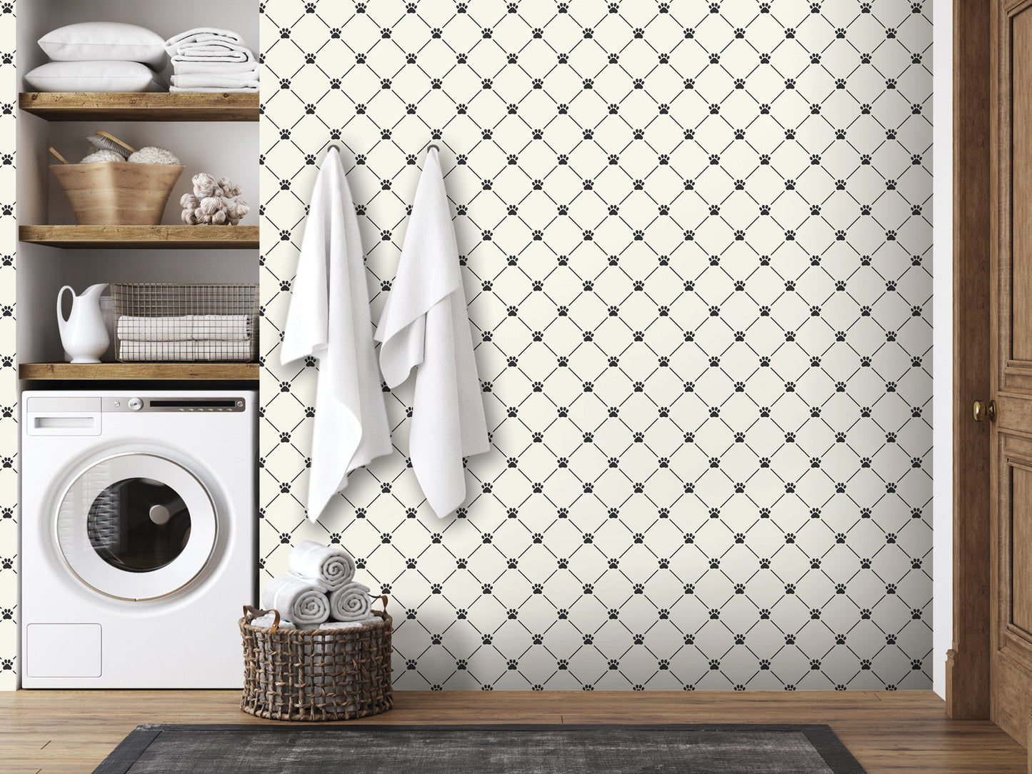 a bathroom with a white washing machine, a basket of towels, and a wooden shelf with various items. The wall has a black and white diamond pattern, and the floor is covered with a gray rug.