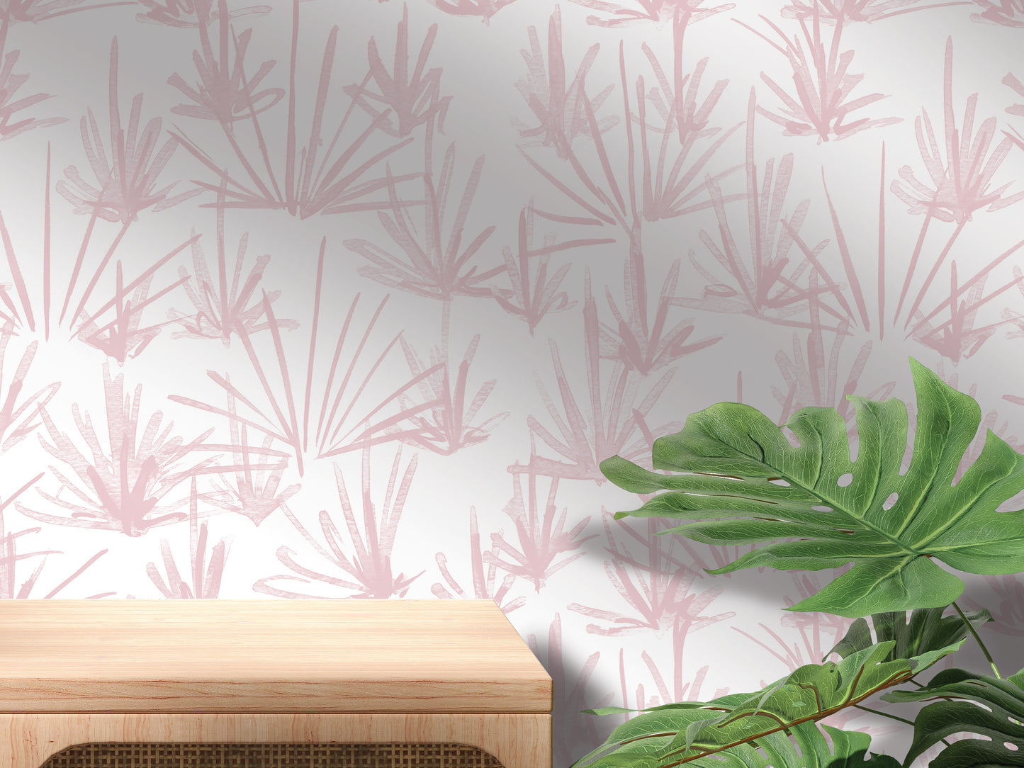 a wooden table with a plant on top of it, set against a wall with a pink and white floral pattern.
