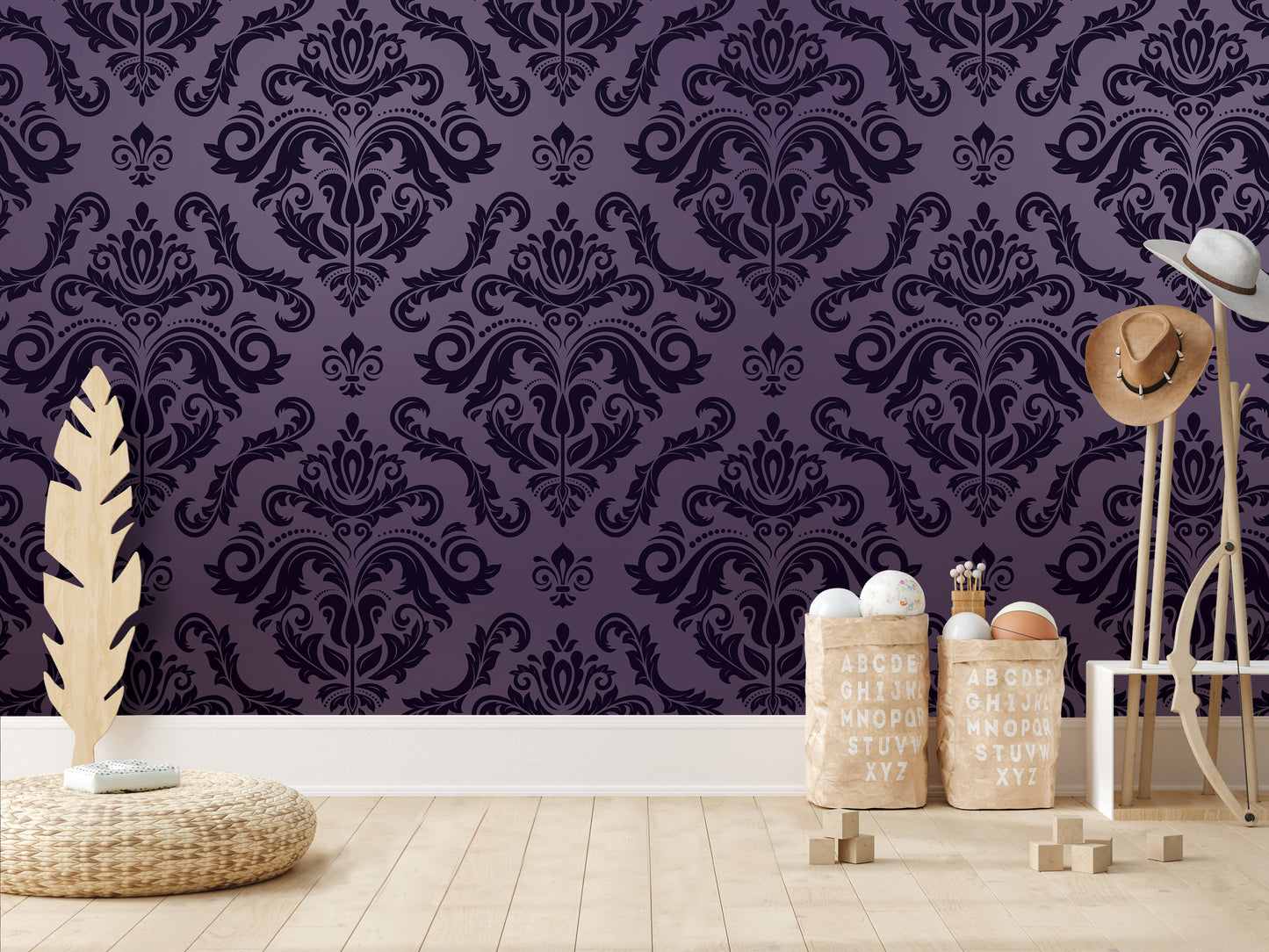 a room with a purple wall with an ornate, damask pattern. In the room, there are two wooden stools, a wicker basket, and a wooden hat stand. The room also contains a wooden chair and a wooden table.