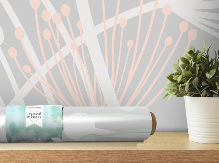 a wallpapered wall with a potted plant on a shelf next to it.