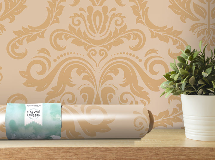 a decorative wallpaper with a floral pattern, a potted plant, and a roll of wallpaper paper on a shelf.