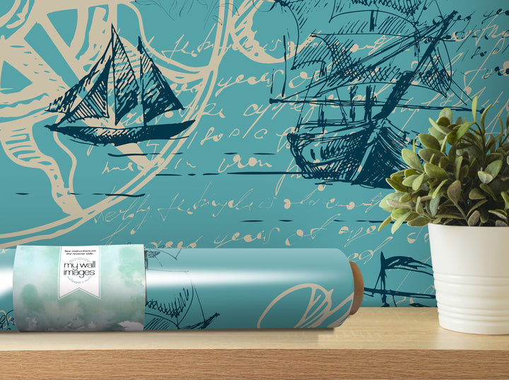 a blue and white sailboat design on a wall, with a potted plant and a roll of wallpaper with a sailboat design on a shelf in the foreground.