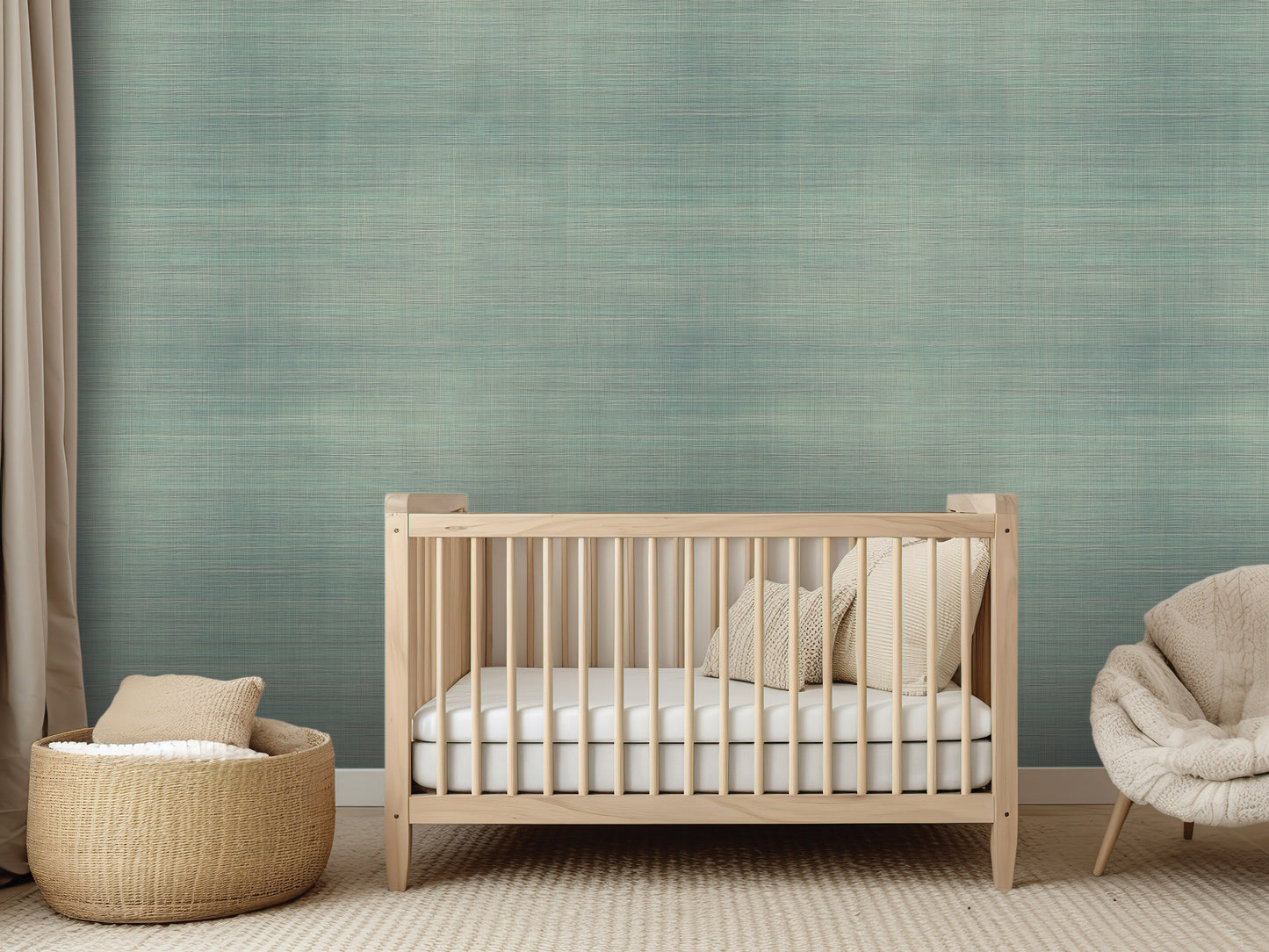 a serene nursery room with a wooden crib, a woven basket, and a plush chair, all arranged against a textured green wall.