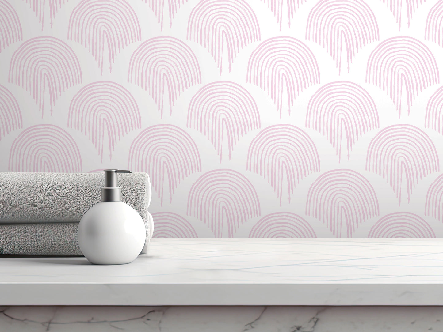 a white countertop with a white soap dispenser and a folded gray towel. The towel is neatly folded and placed on the countertop, which is set against a pink and white patterned wall.