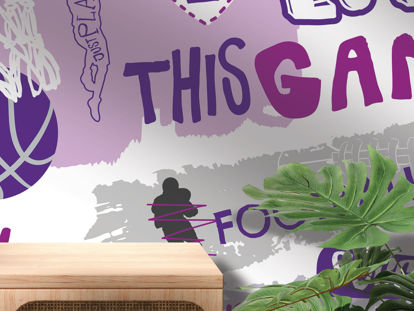 The image is a wall mural with various sports-related elements, including a basketball, a silhouette of a person, and some text. The overall color scheme is purple and white, with the word "THIS" prominently displayed.
