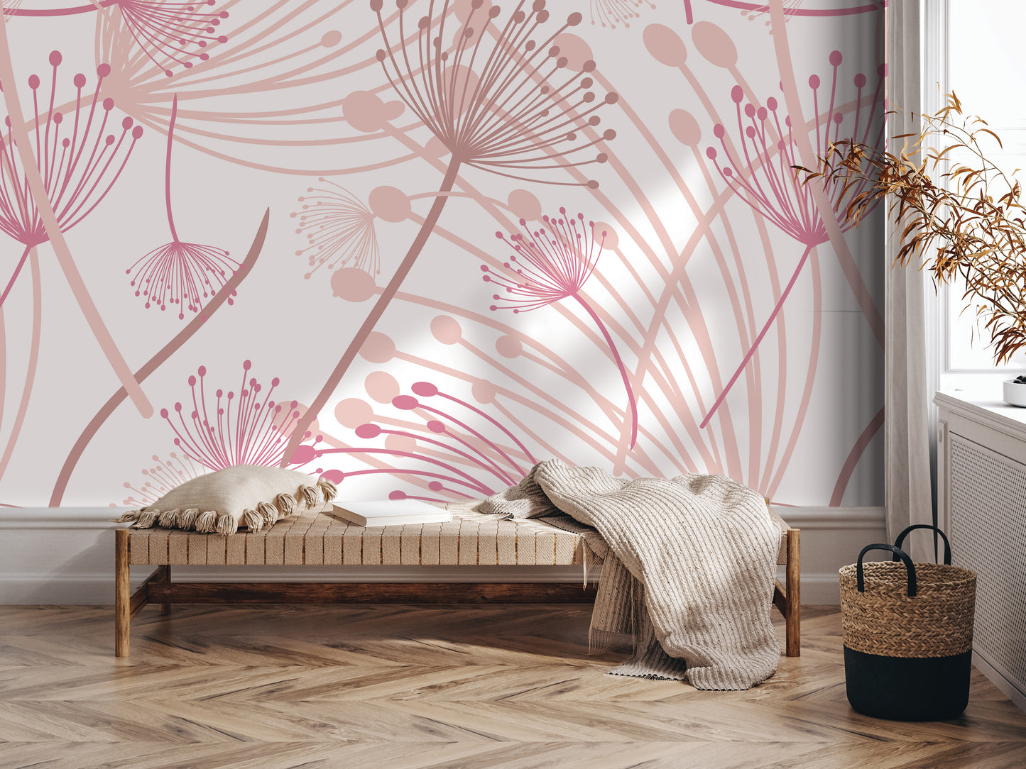 a modern and stylish interior design with a large wall mural featuring pink and white floral patterns. In the foreground, there is a wooden bench with a blanket draped over it, and a woven basket next to it. The overall setting appears to be a cozy and inviting space.