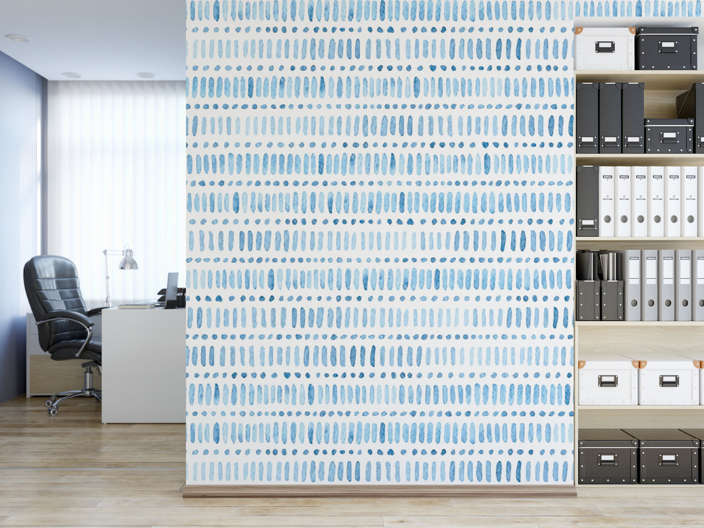 a modern office space with a blue and white patterned wall, a desk with a computer, and a bookshelf filled with various files and folders.