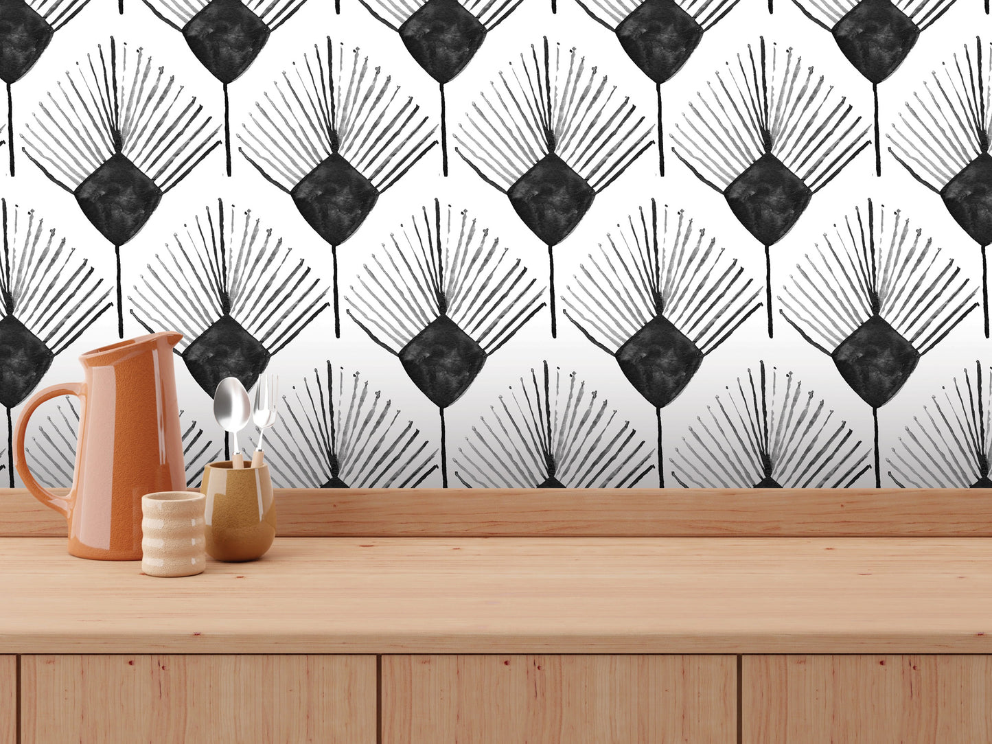 a wooden table with various objects on it, including a pitcher, a small vase, and a spoon. The background has a repeating pattern of black and white stylized leaves.
