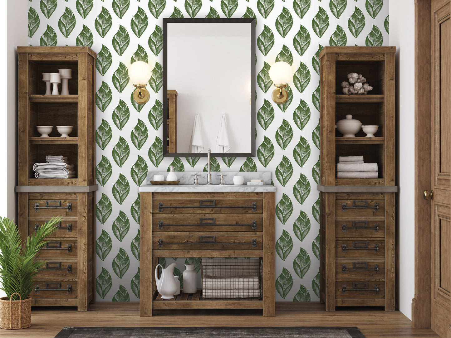 a bathroom with a wooden vanity, a mirror, and a green leaf-patterned wallpaper. The room has two wooden cabinets and a potted plant, creating a cozy and natural atmosphere.