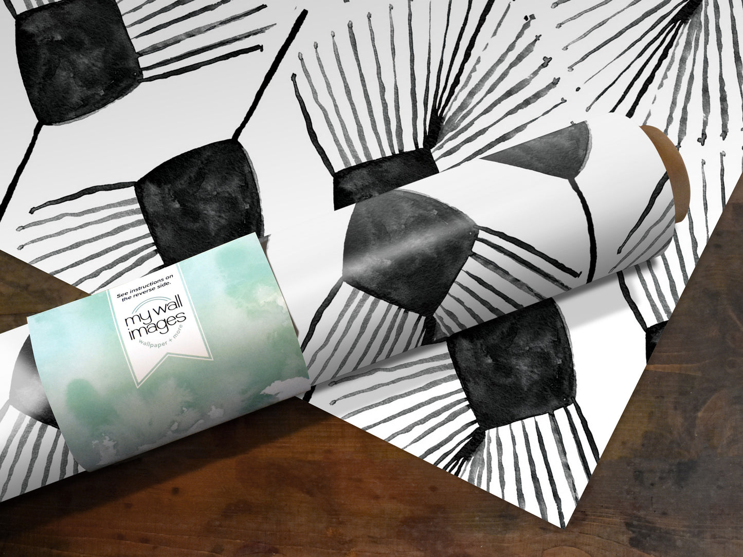 a roll of paper with a black and white abstract pattern, along with a label that reads "mywell images" and "See the reverse for details".