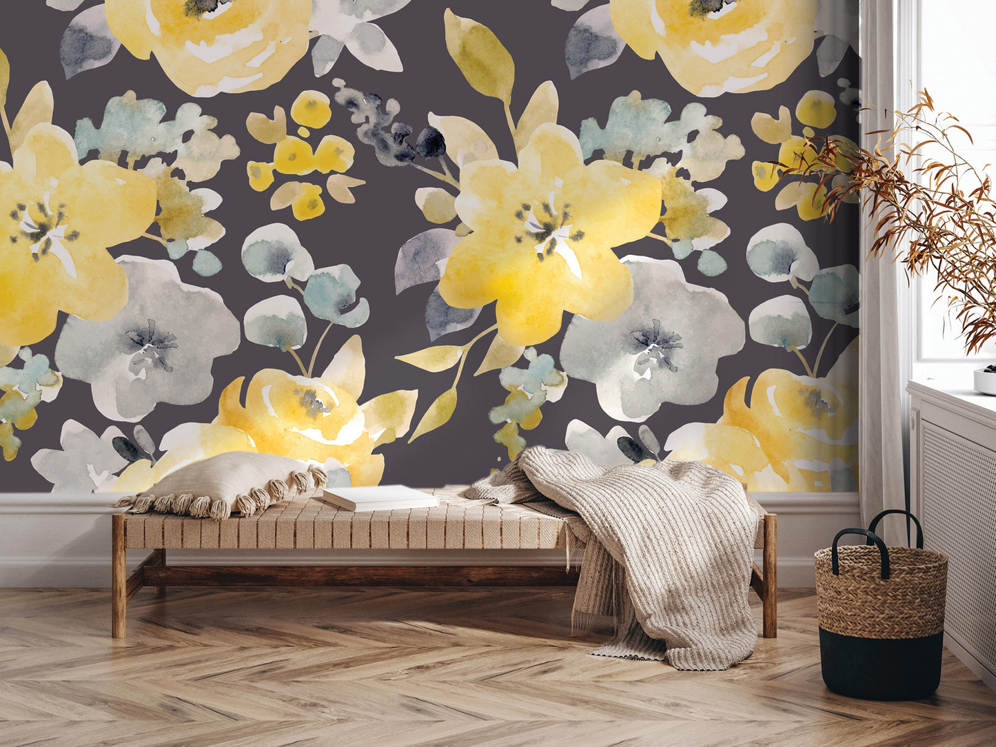 a cozy and inviting living space with a large floral wallpaper as the backdrop. The room is furnished with a wooden bench, a woven basket, and a throw blanket, creating a warm and comfortable atmosphere.