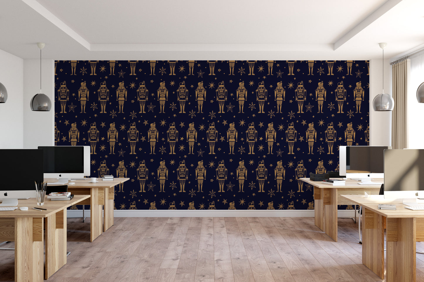 a modern office space with a large wall featuring a repeating pattern of nutcracker figures and stars in gold and black colors.