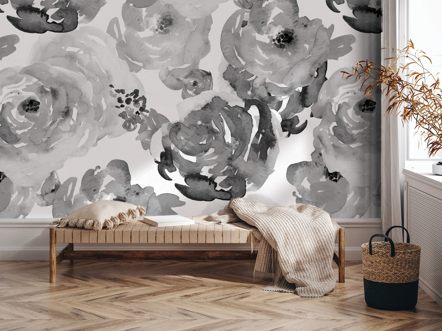 a modern and minimalist interior design with a large black and white floral mural on the wall behind a wooden bench. The bench is positioned in front of a window, and there is a woven basket on the floor next to it. The overall color scheme of the room is predominantly black and white, with the floral mural adding a touch of natural elements to the space.