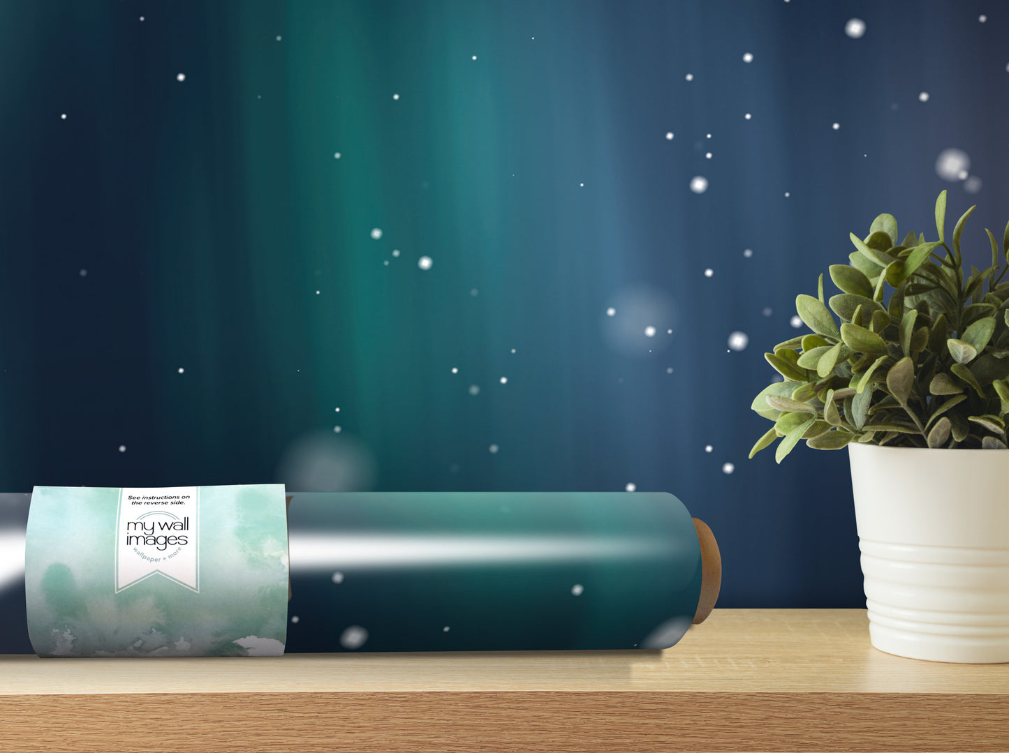 a roll of wallpaper with a label, a potted plant, and a blue background with white stars, creating a serene and cozy atmosphere.