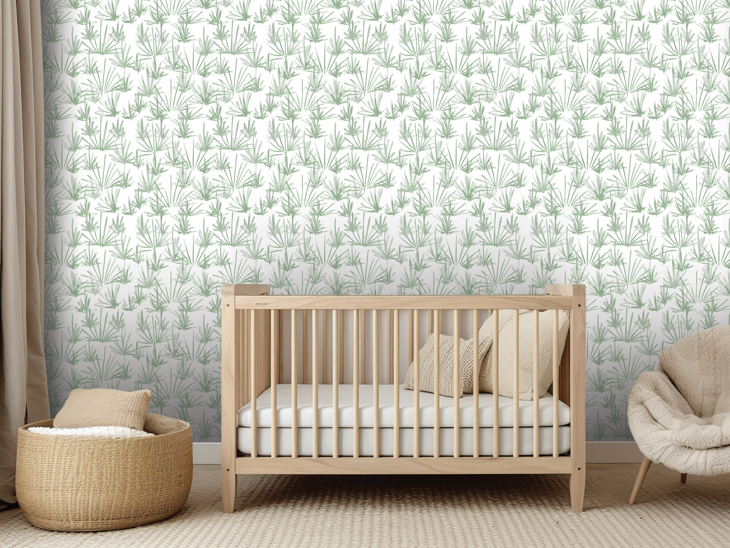 a nursery room with a wooden crib, a woven basket, and a beige chair. The room has a green and white patterned wallpaper, creating a soothing and calming atmosphere.