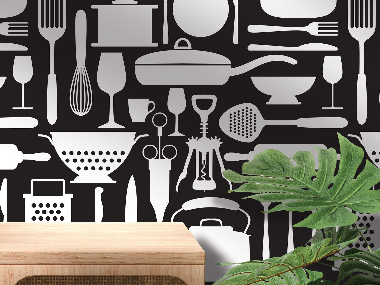 a black and white pattern of various kitchen utensils and appliances, including a knife, spoon, bowl, wine glass, and other items, arranged on a wall.
