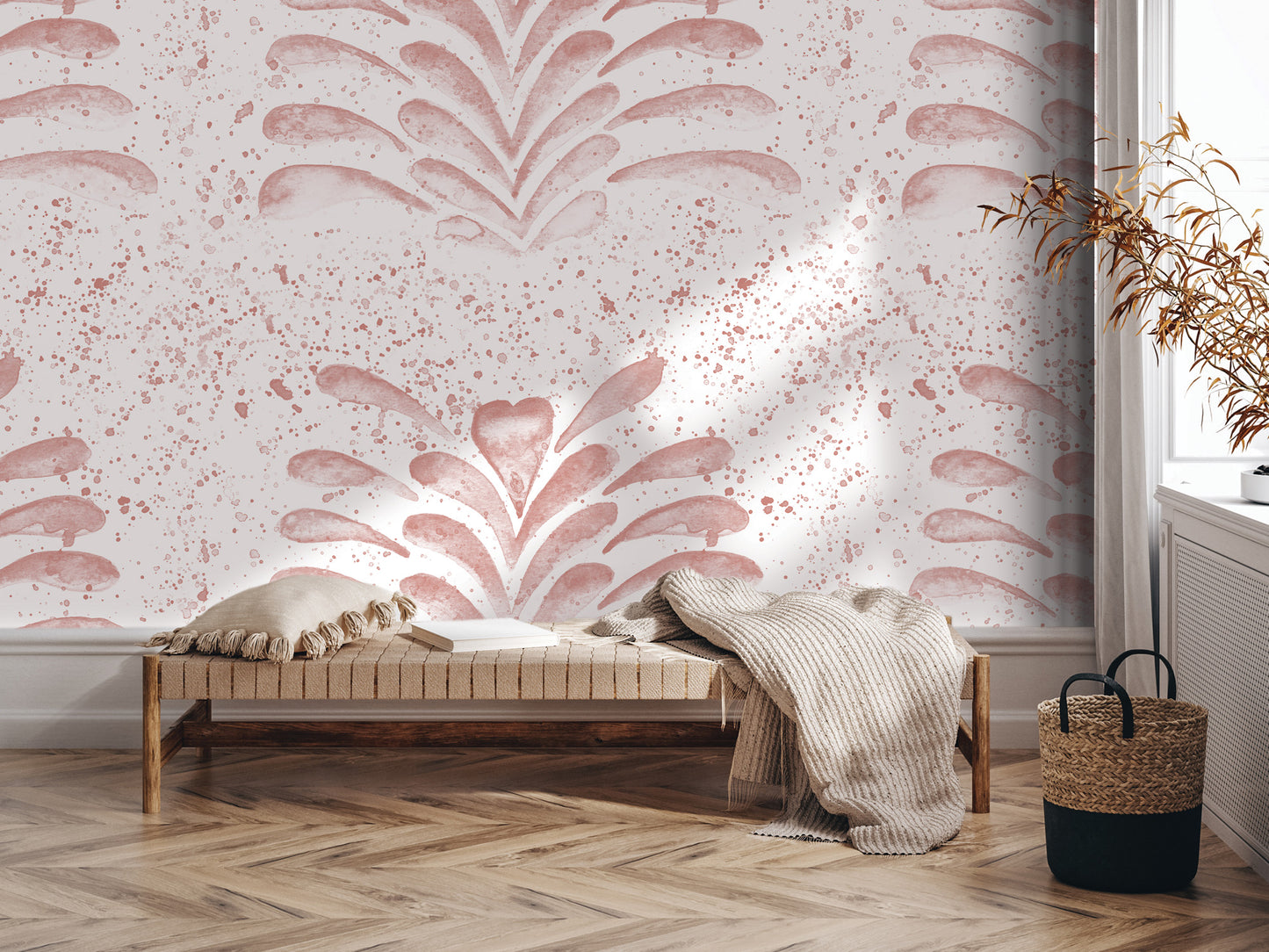 a cozy and inviting living space with a bench, a woven basket, and a plant. The bench is positioned against a wall with a pink and white patterned wallpaper, creating a warm and comfortable atmosphere.