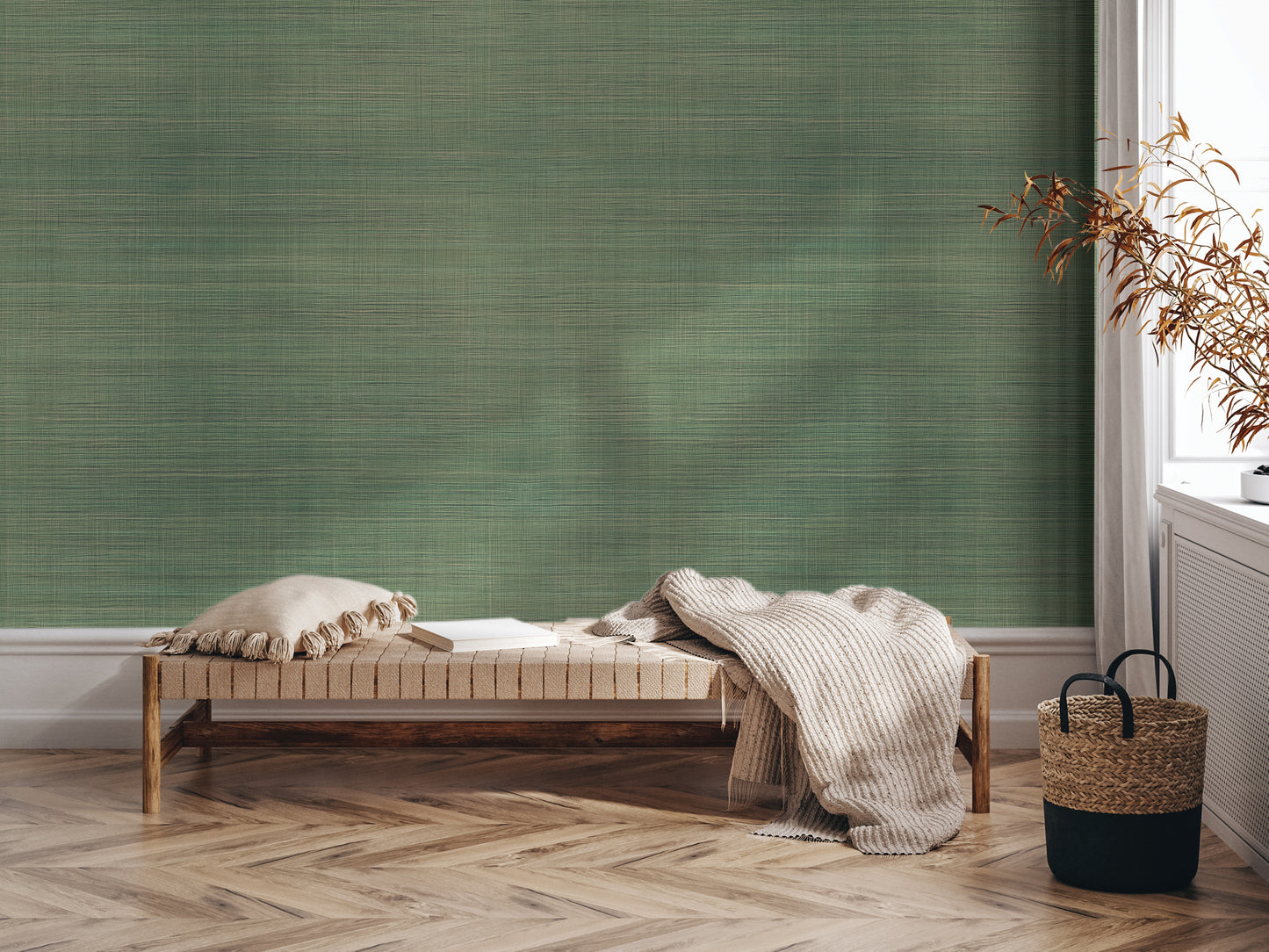 a cozy corner with a wooden bench, a woven basket, and a green textured wall.