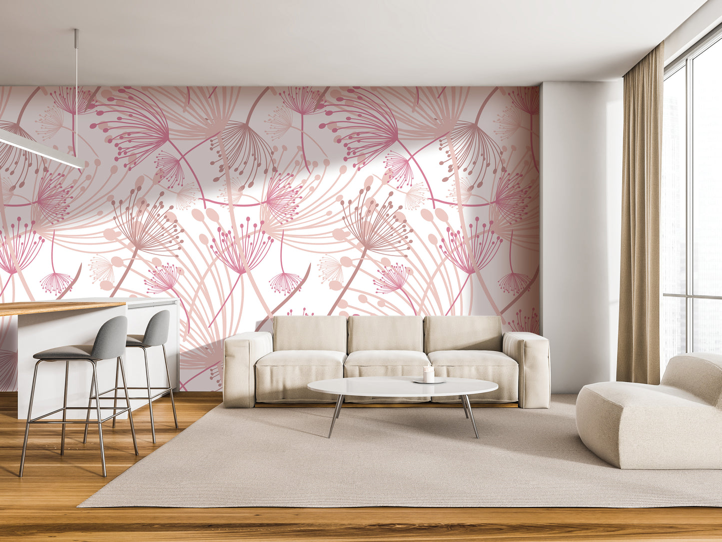a modern living room with a pink and white floral pattern on the wall behind a white sofa and a round coffee table. The room also includes a dining area with a bar and stools, and a large window with curtains.