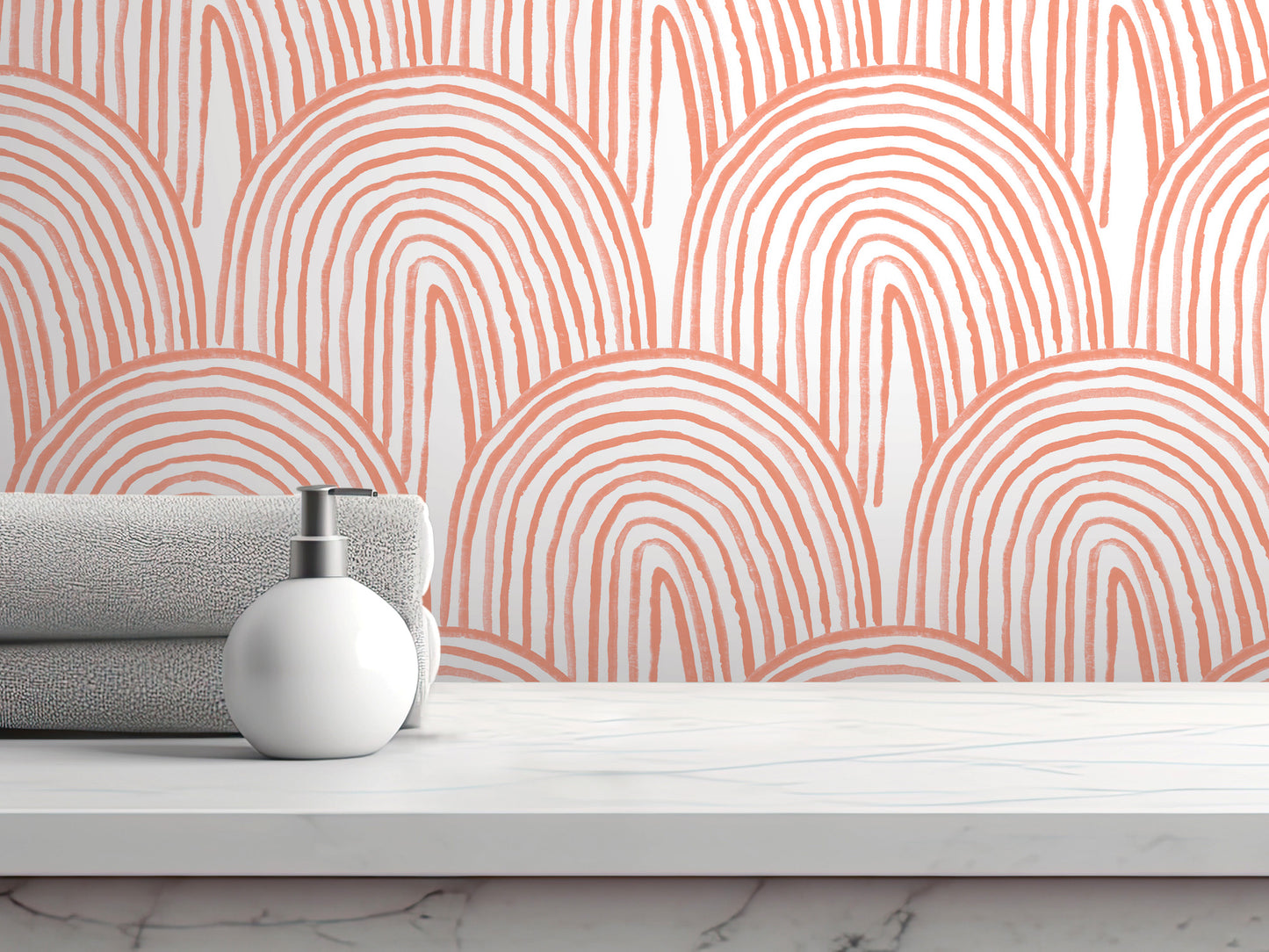 a white countertop with a white soap dispenser and a folded towel, set against a vibrant, abstract orange and white patterned wall.