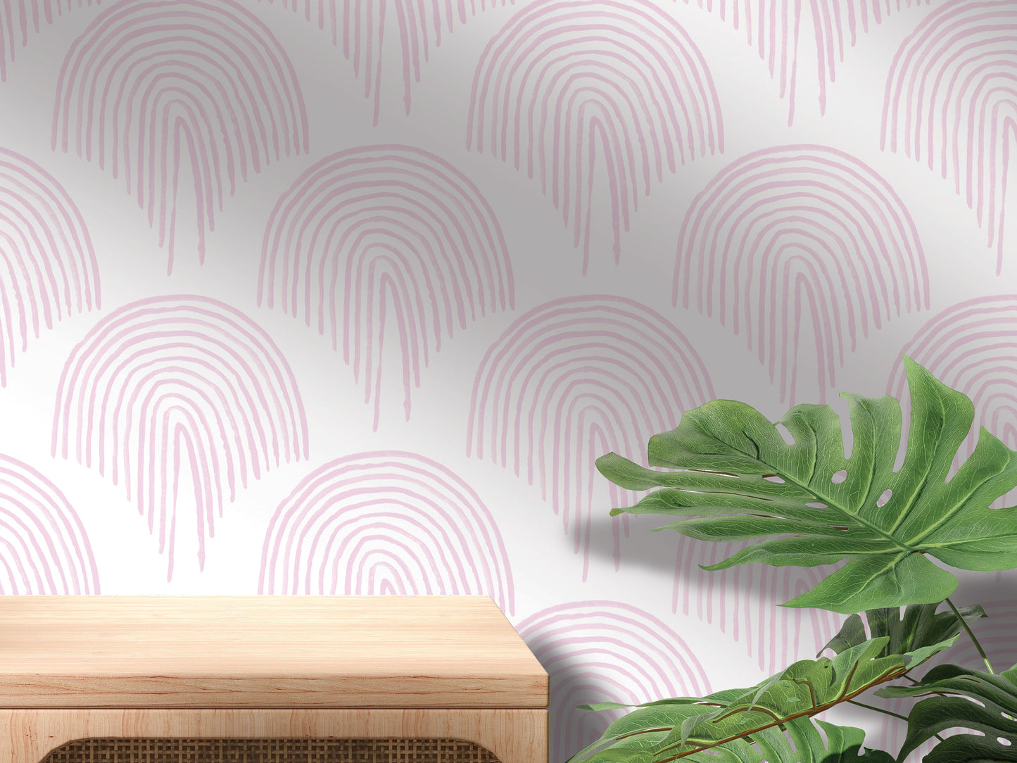 a wooden table with a plant on top of it, set against a wall with a repeating pattern of pink and white arches.