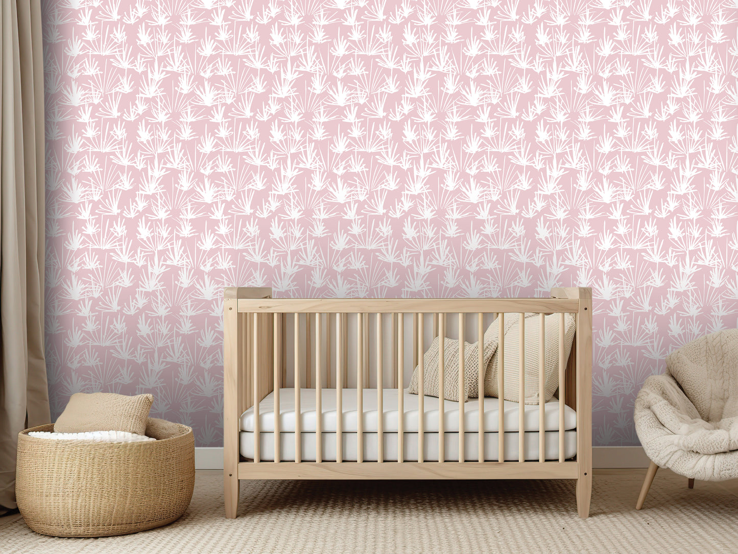 a nursery room with a wooden crib, a woven basket, and a beige chair. The walls are covered in a pink and white patterned wallpaper, creating a cozy and inviting atmosphere.