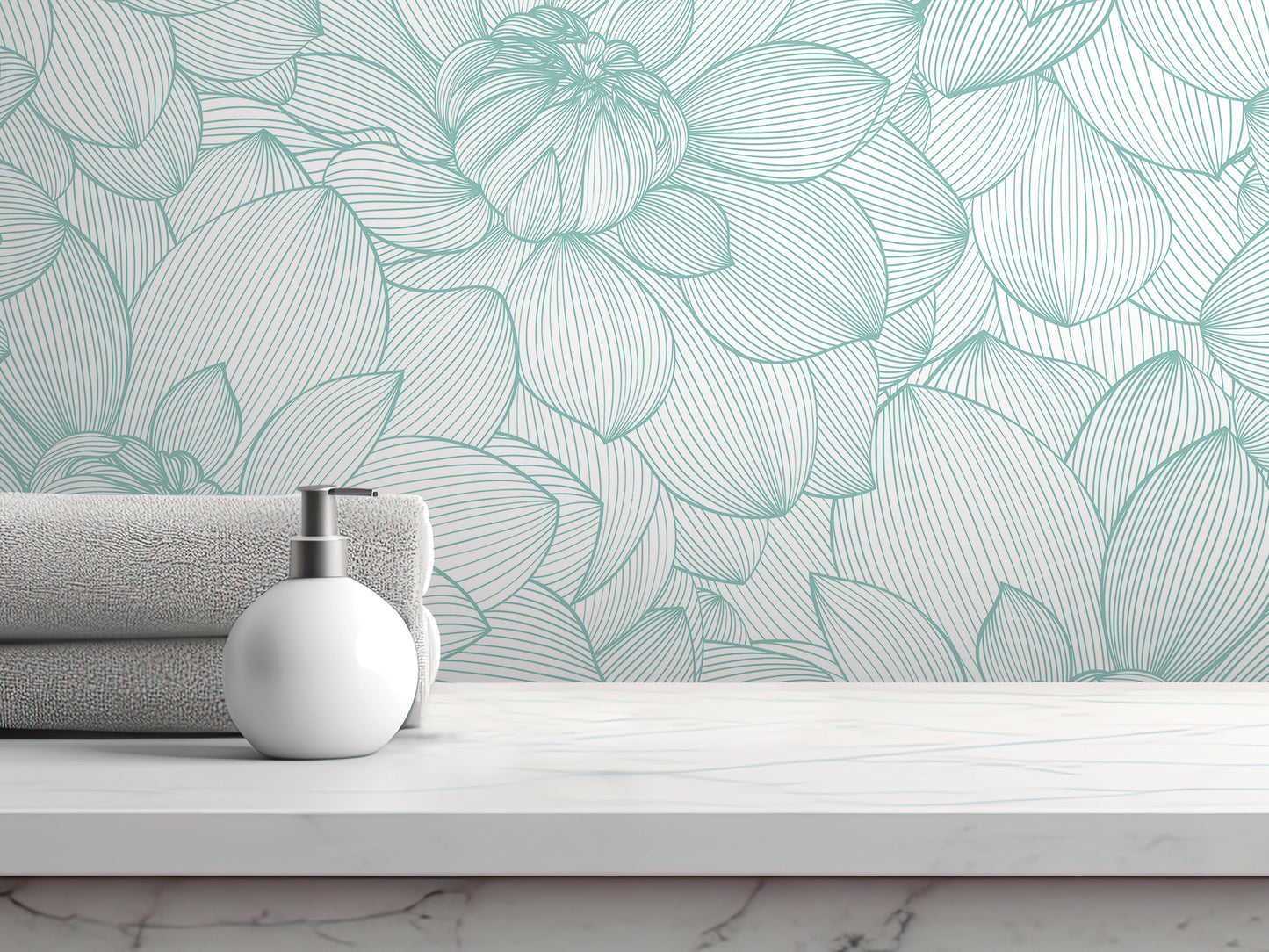 a white soap dispenser on a white marble countertop, with a folded towel and a green and white floral wallpaper in the background.