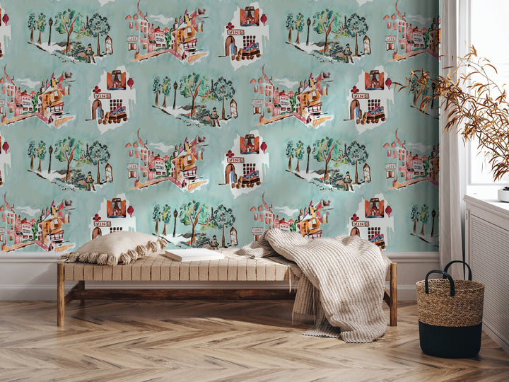 a cozy and inviting living space with a wooden floor, a bench, and a woven basket. The wall behind the bench is adorned with a vibrant, colorful wallpaper depicting whimsical houses and trees. The overall atmosphere of the room is warm and inviting, with the wooden floor and the bench providing a comfortable seating area.