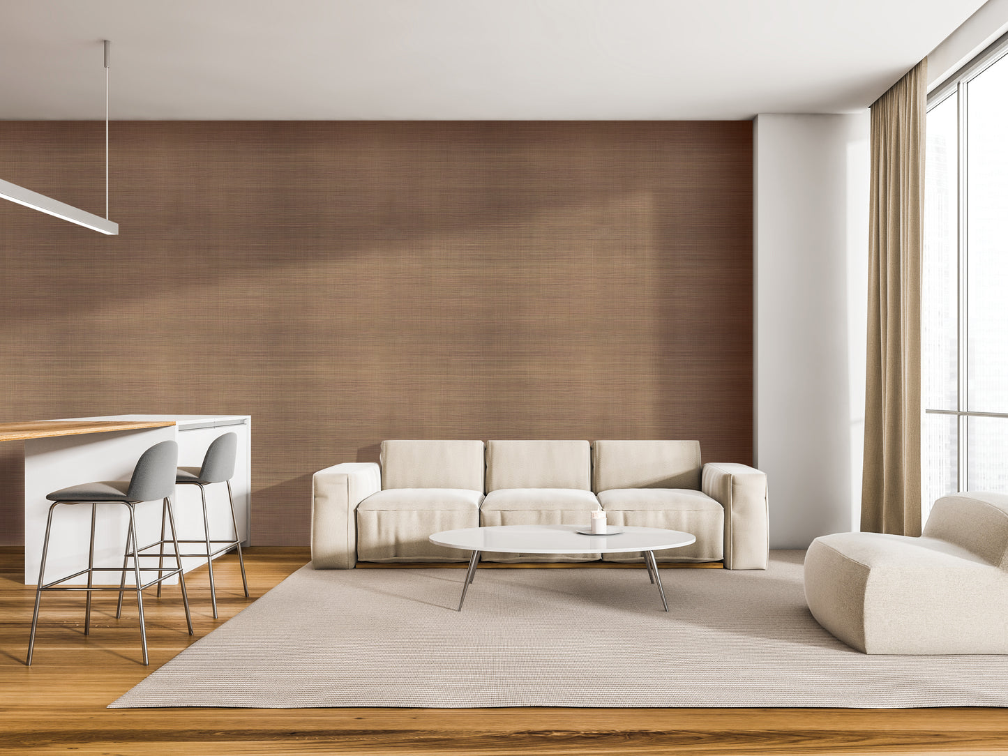 a modern living room with a white sofa, a round coffee table, and a bar with stools. The room has a neutral color scheme with brown and white tones, and the furniture appears to be minimalist and well-designed.