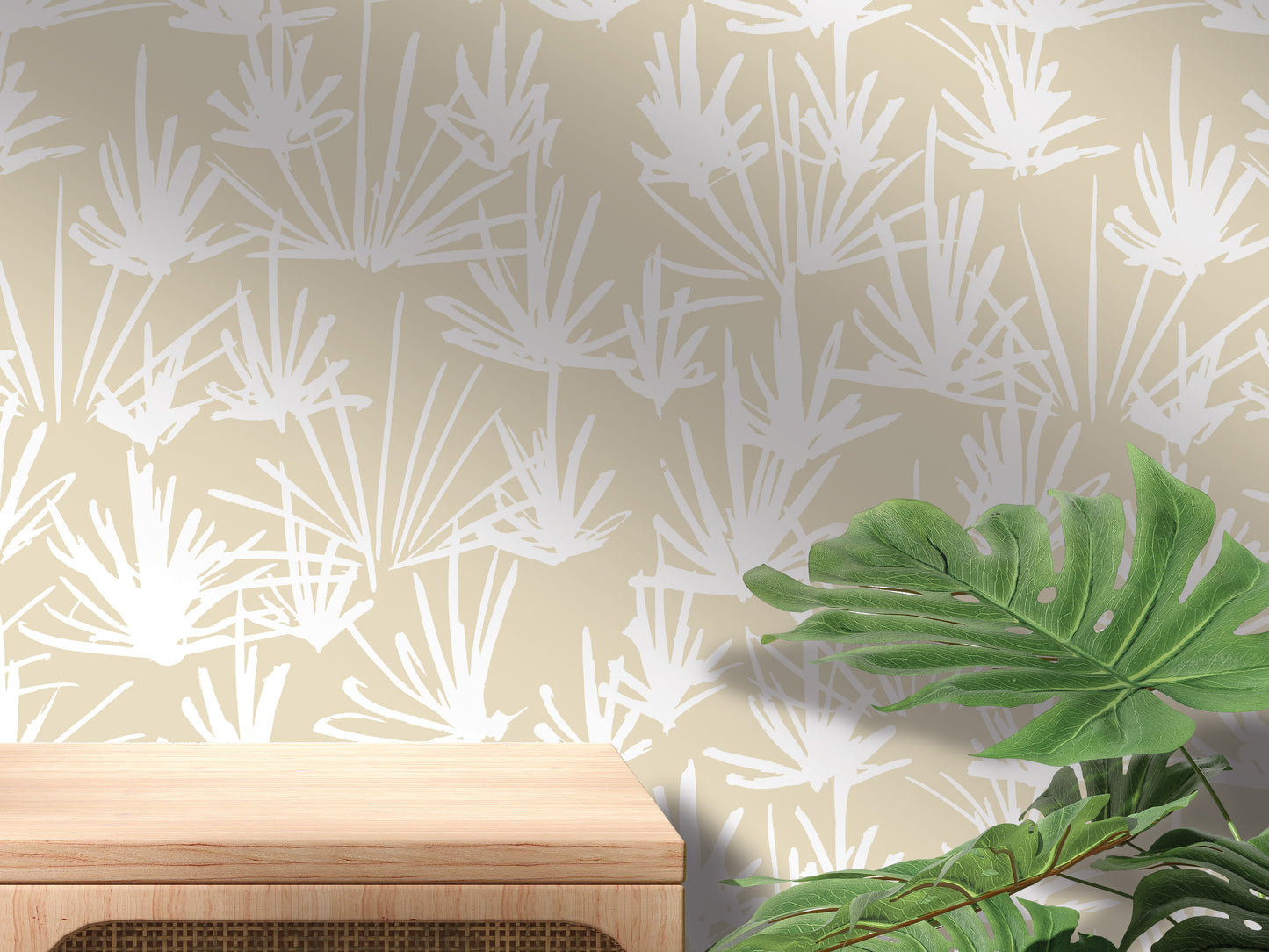 a wooden table with a plant on top of it, set against a wall with a repeating pattern of white leaves and stems.
